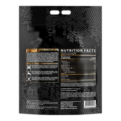Back of a black Mass Infusion 12lbs by Nutrex Research bag showing Nutrition Facts, usage instructions, and ingredients in white and orange text, with dotted pattern and double handle cutouts at the top for muscle growth support.